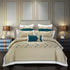 Beige and teal geometric bedding set with decorative pillows in a modern bedroom