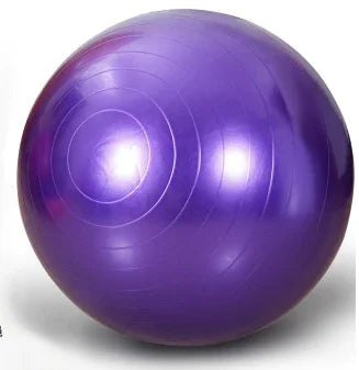 Glossy purple exercise ball with textured lines, fit for home workout or yoga routines