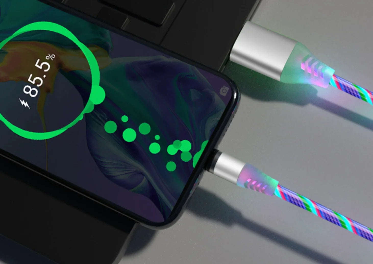 Colorful LED charging cable with glowing braided design connected to a smartphone