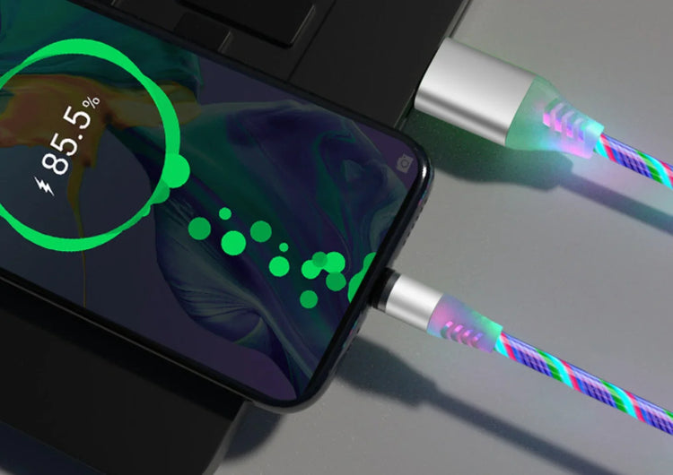 Colorful LED charging cable with glowing braided design connected to a smartphone