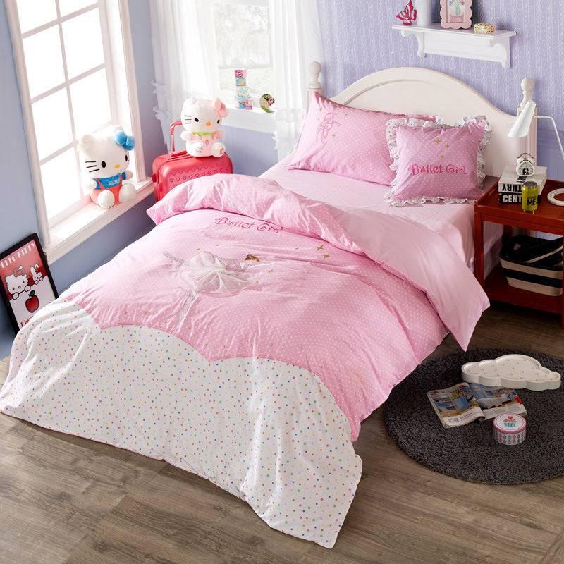 Pink polka dot bedding set with white and multicolor details, ruffled pillow, cotton material, twin size fit in a girl's bedroom.
