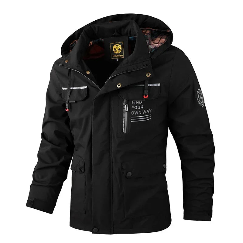 Men’s black hooded jacket with zipper pockets, reflective details, and modern streetwear style.