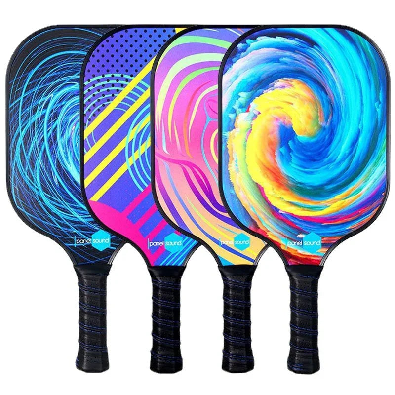 Four colorful pickleball paddles with abstract graphic designs and textured black grips