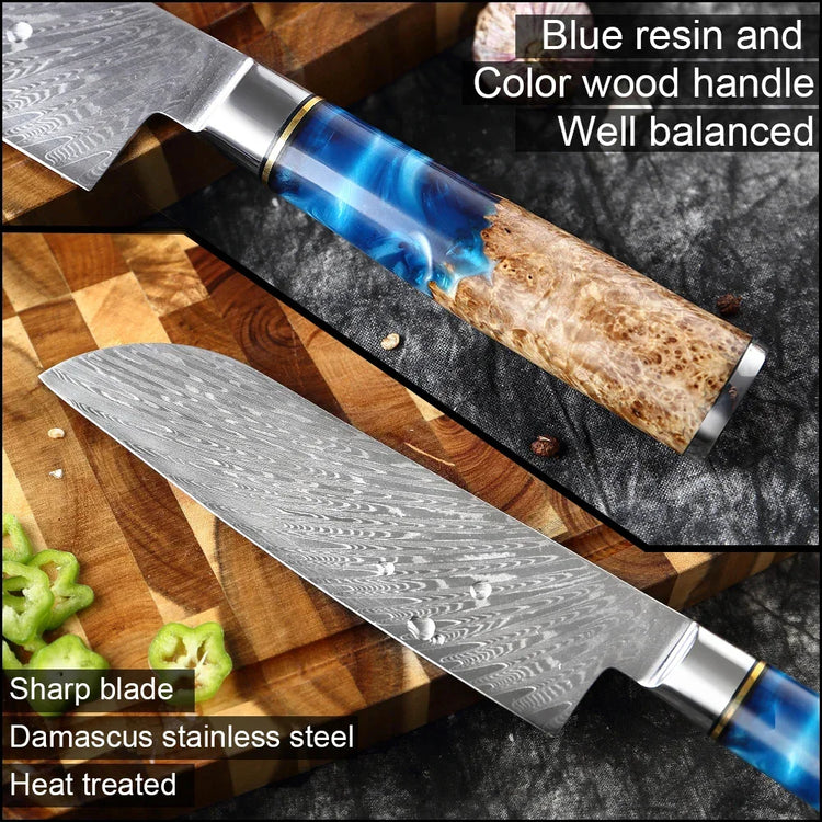 Damascus stainless steel chef knife with blue resin and wood handle on wood cutting board