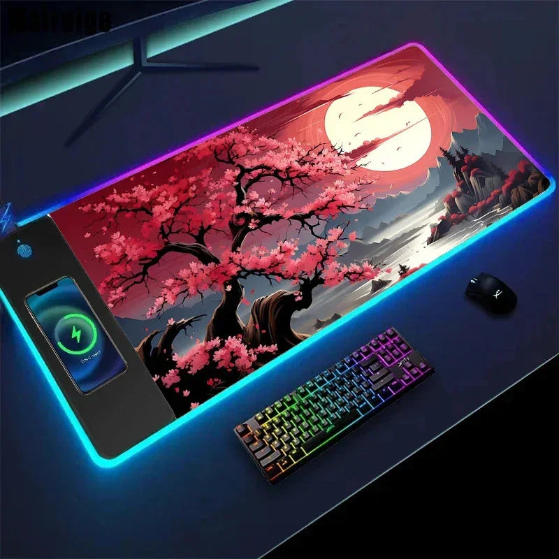 Large RGB gaming mouse pad with cherry blossom design, wireless charger, and neon edges
