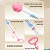 Pink and white pull-type water cannon with large tank, rounded handle, and multi-hole spray nozzle for strong water blast