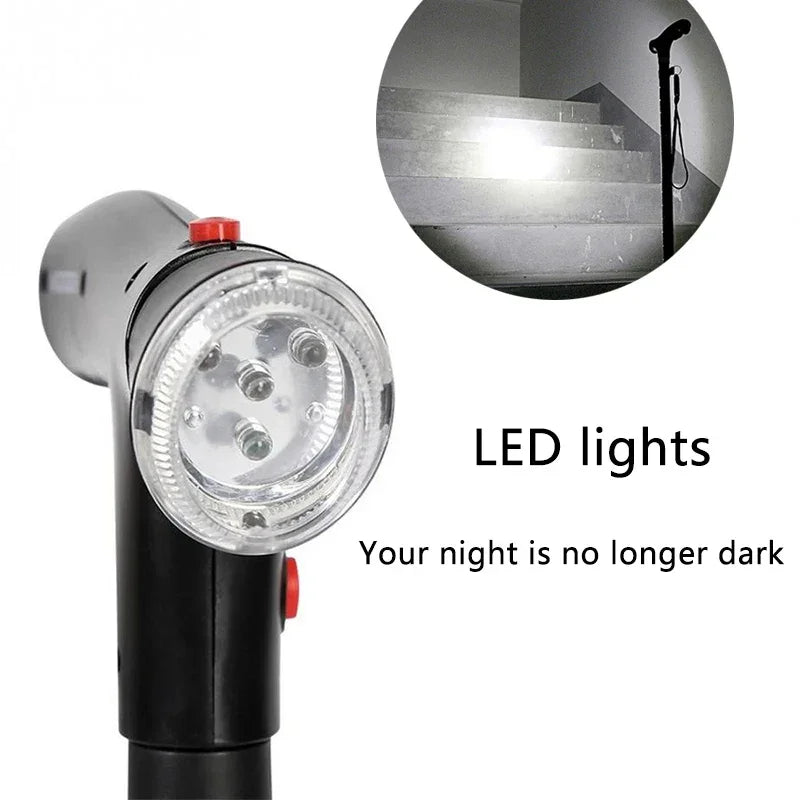 Close-up of black walking cane with built-in LED lights, shown illuminating stairs in the dark.