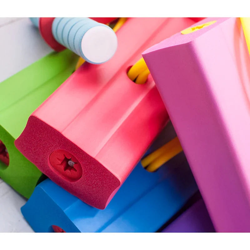 Colorful foam handles with yellow resistance bands, close-up fitness equipment