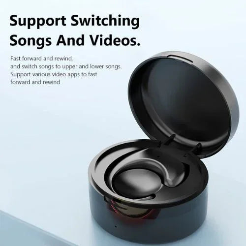 Black wireless earbuds in round charging case on light background, modern tech accessory