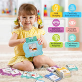 Little girl in a yellow short-sleeve dress with ruffle collar, sitting and playing with educational flashcard toy