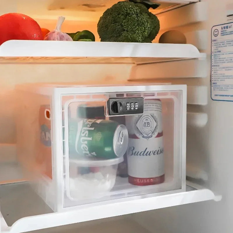 Clear plastic fridge lock box with combination lock storing cans and food containers on a refrigerator shelf.