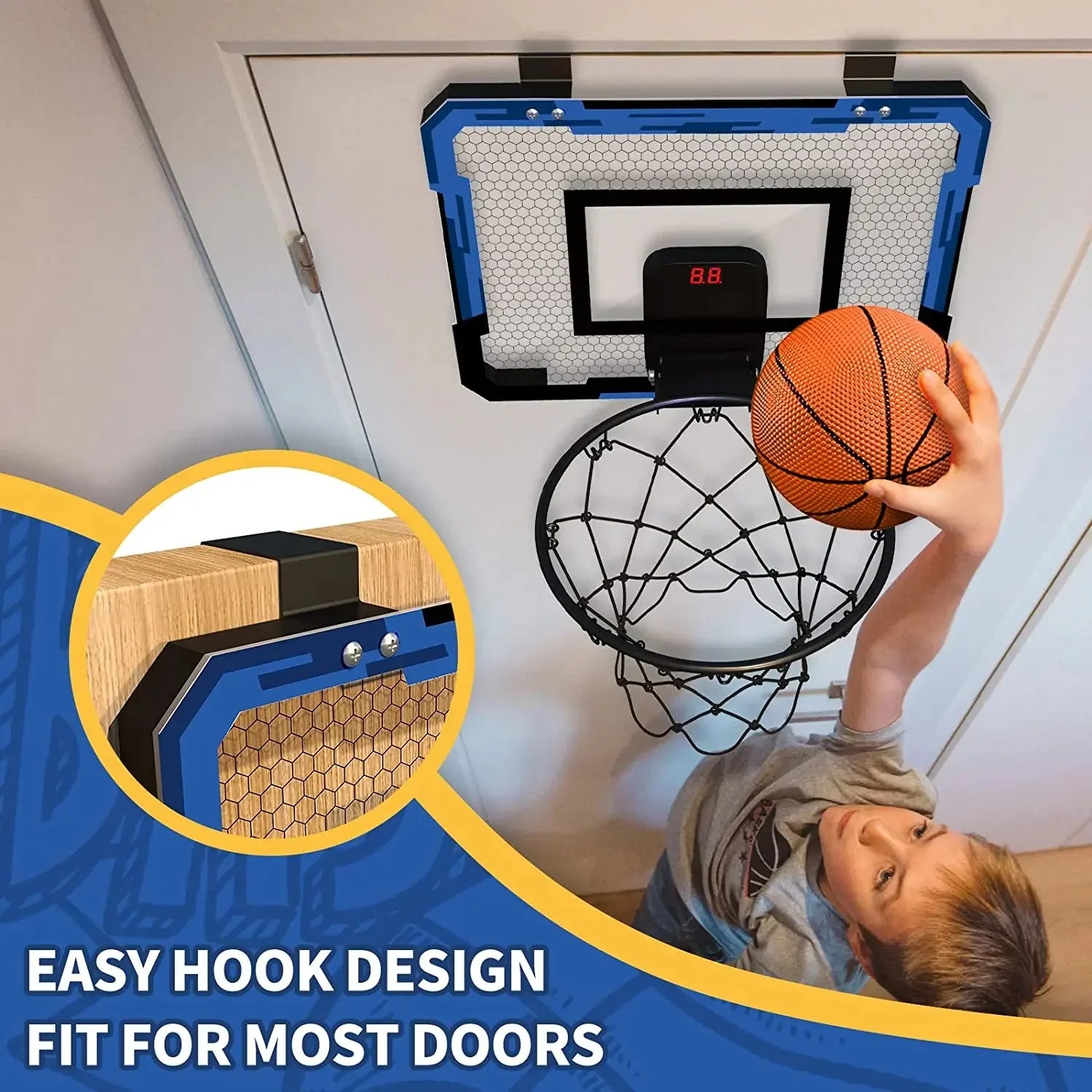 Kid in grey short sleeve shirt playing indoor basketball, blue backboard, relaxed fit.