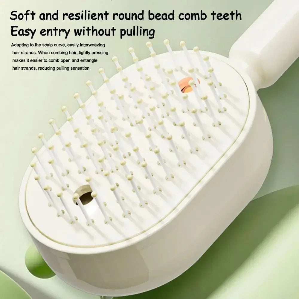 Close-up of ergonomic white detangling hairbrush with soft round bead bristles