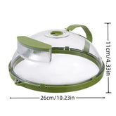 Clear plastic food cover with green trim, handle, and air vent, measuring 26cm by 11cm