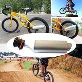 Yellow BMX bike with a silver plastic exhaust pipe attachment, outdoor action scenes