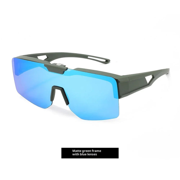 Futuristic matte green sunglasses with blue mirrored shield lenses and angular frame design.