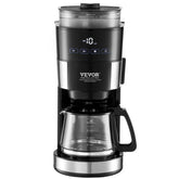 Sleek black and stainless steel drip coffee maker with digital display and glass carafe