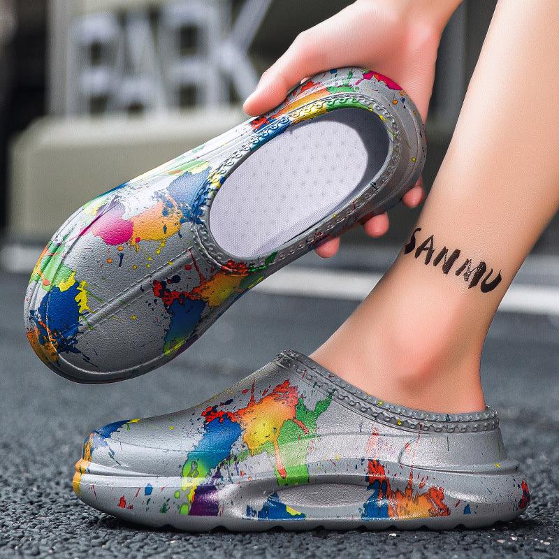 Silver slip-on clogs with colorful paint splatter design, casual streetwear style