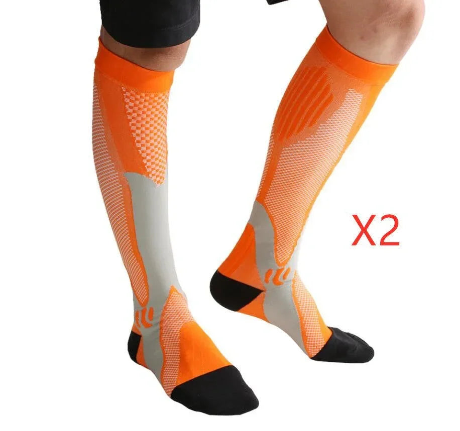 Knee-high orange and white compression socks with black toes, athletic fit, breathable material