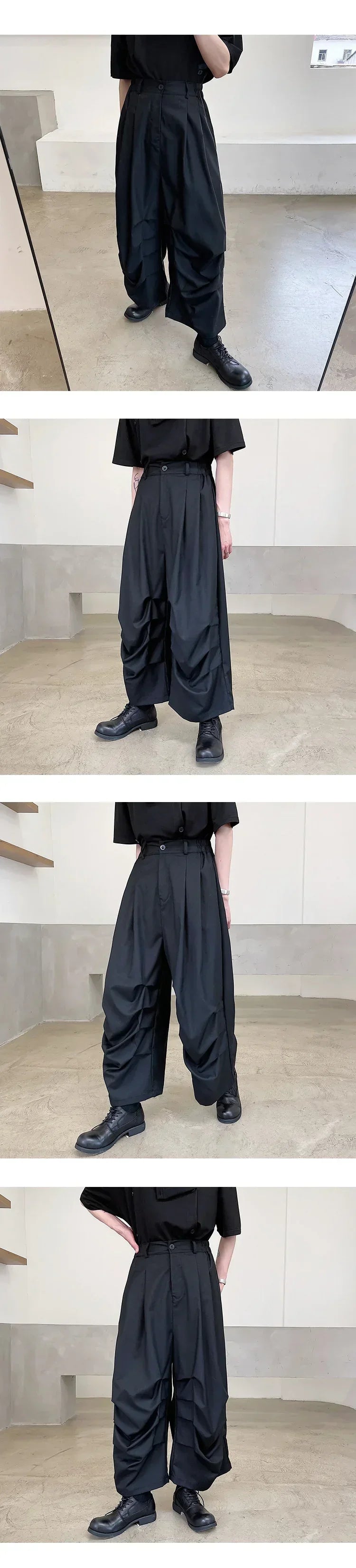 Loose fit black wide-leg pleated trousers in lightweight material, streetwear style