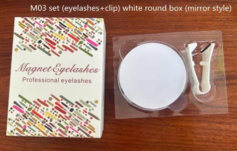 Magnetic eyelashes set with white round mirror box and applicator on wooden surface