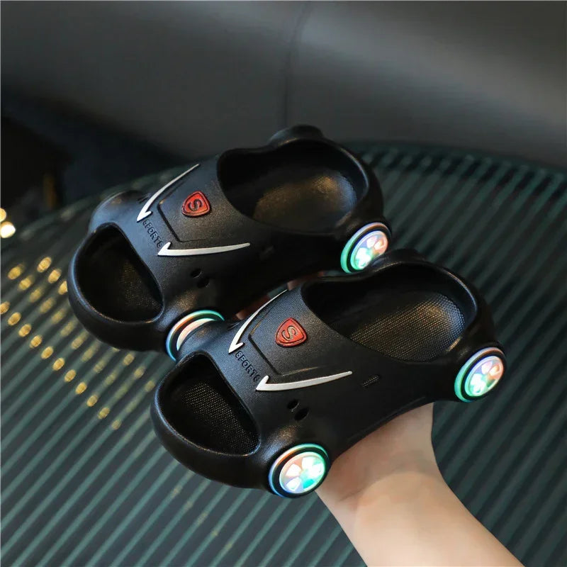 Black car-shaped sandals with open toe, LED wheel lights, and casual slip-on fit