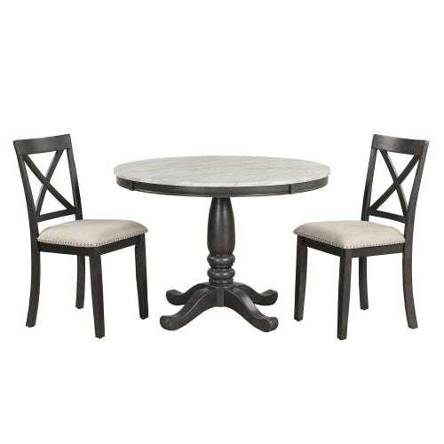 Round wooden table with pedestal base and two cushioned dining chairs, modern rustic style