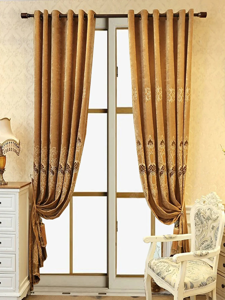 Gold velvet curtains with elegant embroidered pattern, rod pocket style, classic fit on window