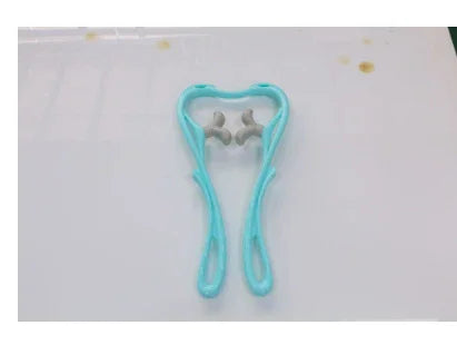 Light blue ergonomic plastic hand grip strengthener with gray resistance rollers on white surface