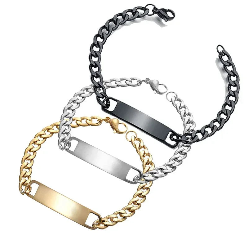 Set of three curb chain bracelets in black, silver, and gold with blank metal plates