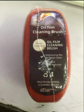 Red multifunctional oil film cleaning brush with plastic bristles, compact ergonomic design