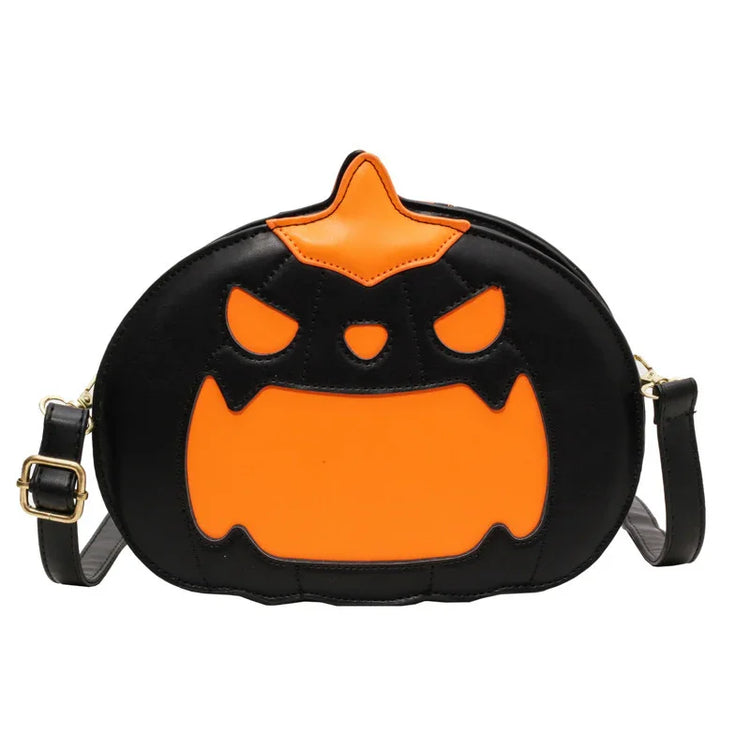 Black and orange faux leather crossbody bag with pumpkin face design and adjustable strap