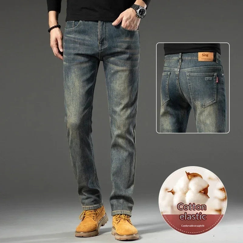 Men's straight fit blue cotton elastic jeans with faded wash, showcased front and back.