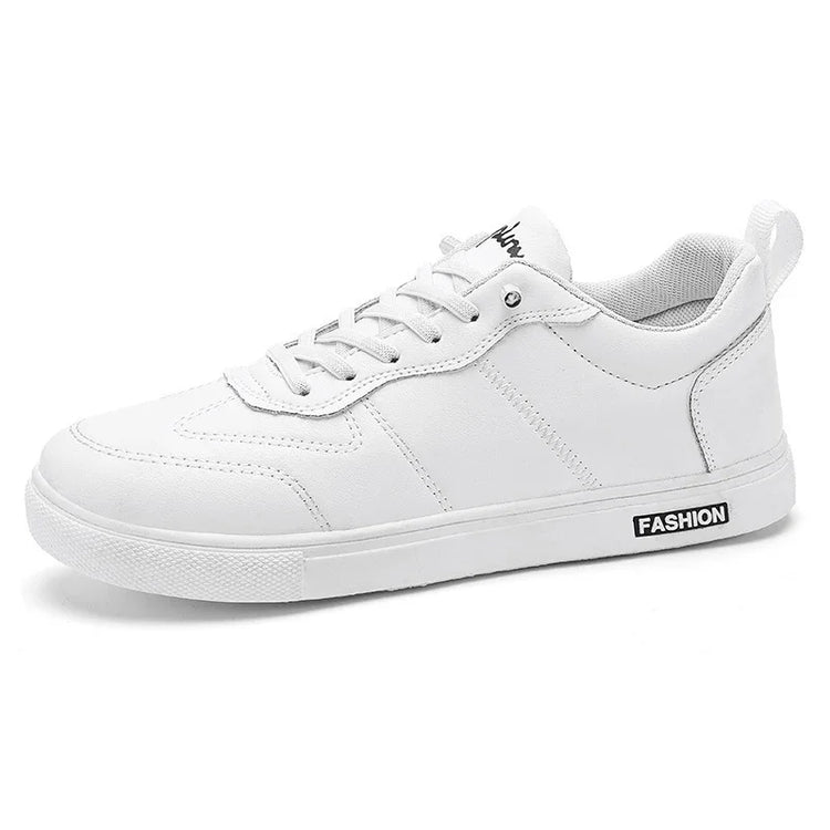 White low-top sneaker with lace-up closure, synthetic leather material, and minimal sporty style