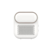 White compact wireless speaker with rounded design and perforated grill front
