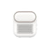 White compact wireless speaker with rounded design and perforated grill front