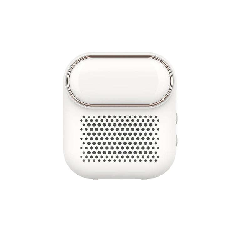 White compact wireless speaker with rounded design and perforated grill front