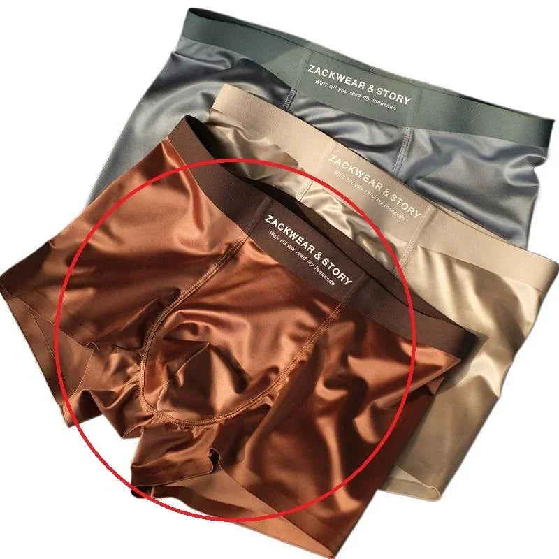 Set of three men's boxer briefs in bronze, gray, and beige, silky smooth material, modern fit