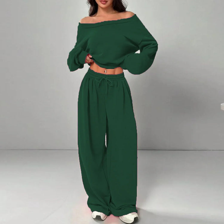 Woman wearing dark green off-shoulder long sleeve top and wide-leg sweatpants set, relaxed fit