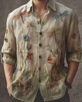 Men’s light beige linen shirt with colorful embroidered dragonflies and floral patterns, relaxed fit