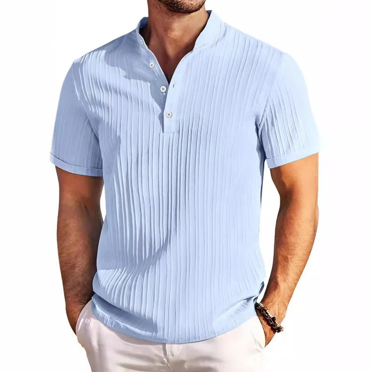 Light blue short sleeve textured shirt with vertical stripes and a relaxed fit