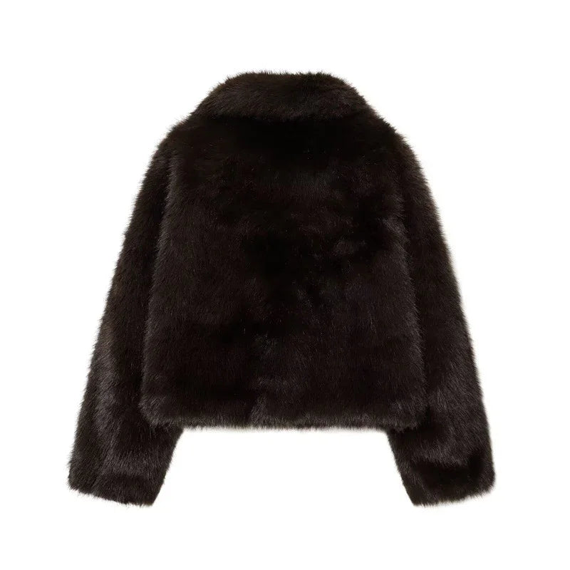 Black faux fur cropped jacket with long sleeves and relaxed fit, back view