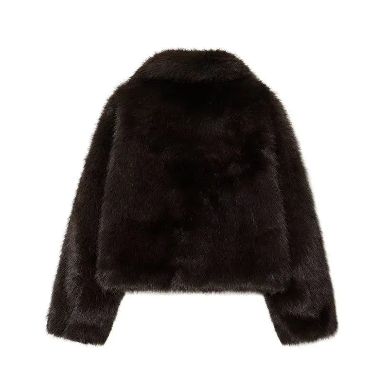 Black faux fur cropped jacket with long sleeves and relaxed fit, back view