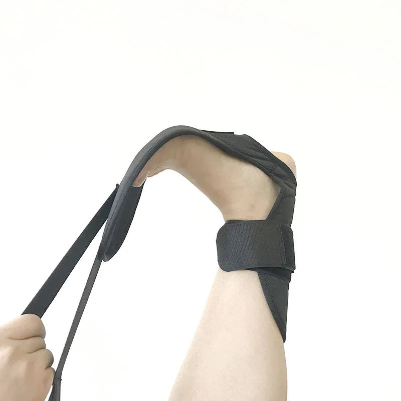 Black adjustable foot support strap on ankle, soft fabric, ergonomic fit