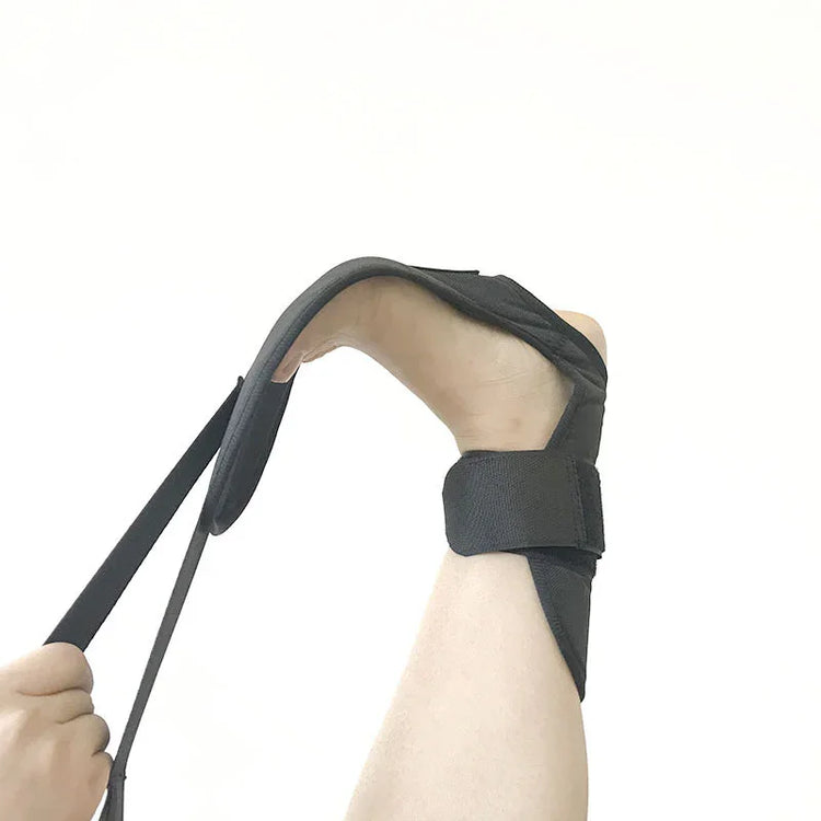 Black adjustable foot support strap on ankle, soft fabric, ergonomic fit