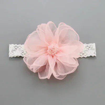 Sheer pink flower headband with white lace elastic, soft and feminine hair accessory.