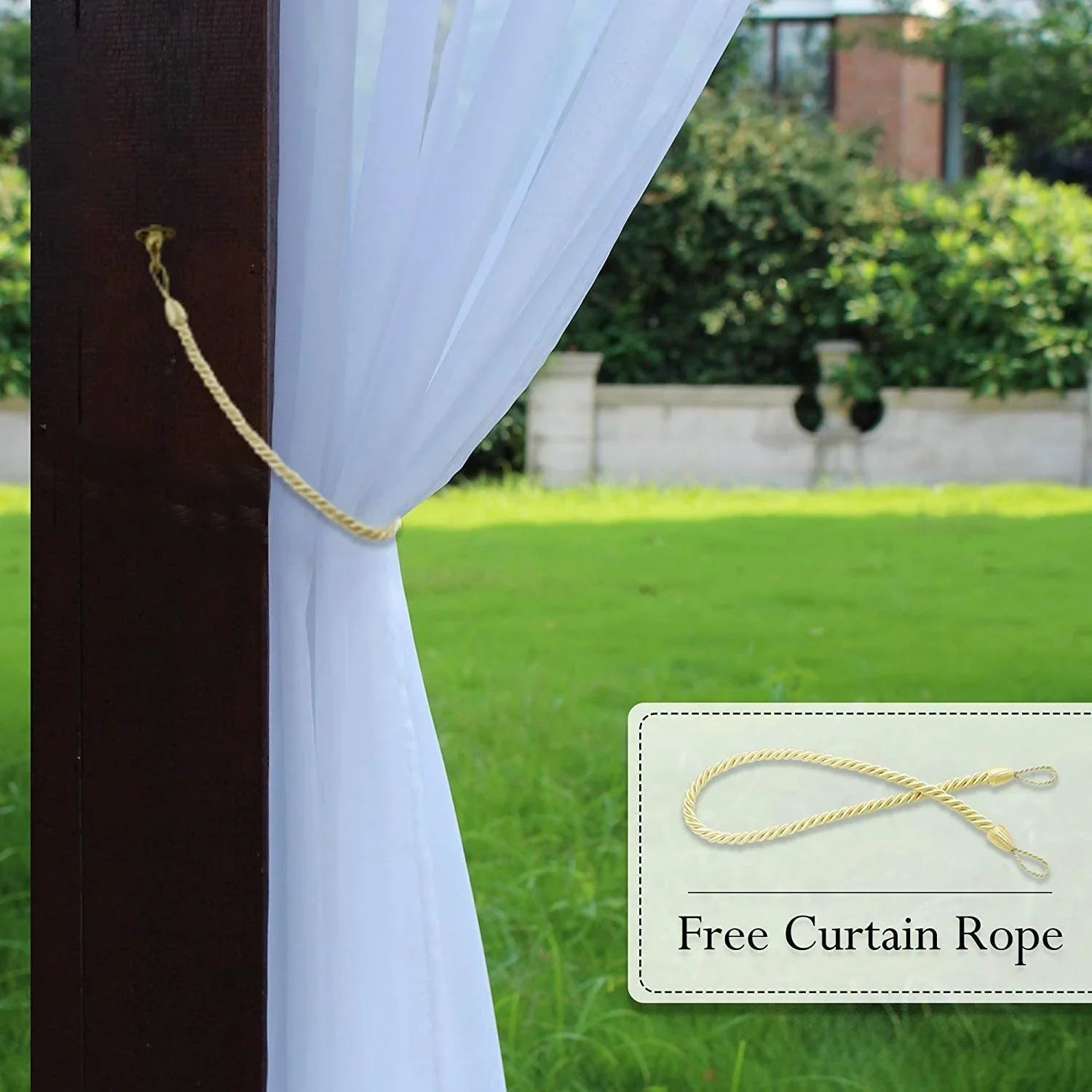 Outdoor white sheer curtain with free yellow tieback rope, draped on wooden post