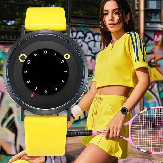 Woman in yellow cropped athletic top and shorts set with blue stripes, wearing yellow wristwatch, holding tennis racket, urban graffiti background.