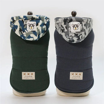 Two thick dog hoodies in green and navy, camo hoods with cartoon patch, quilted fabric, relaxed fit.