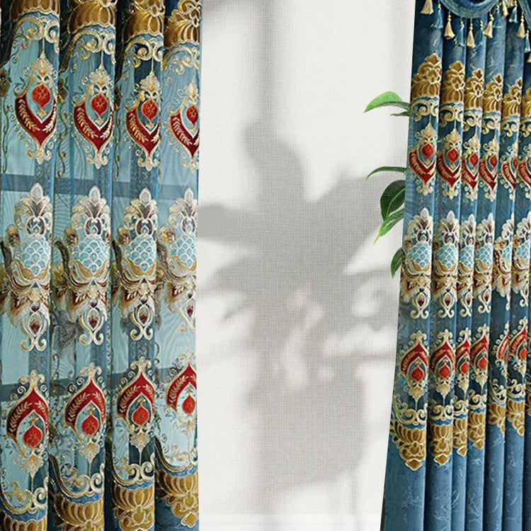 Luxurious blue and gold velvet curtains with intricate embroidered floral patterns, modern fit